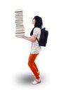 Woman Carrying Books Royalty Free Stock Photo