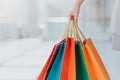 Woman carrying colorful shopping bags Royalty Free Stock Photo