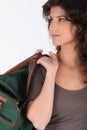 Woman carrying a duffel bag