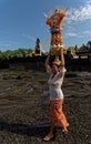 Woman carrying fruits, Bali