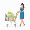 Woman is carrying a grocery cart full of groceries in the supermarket. Vector illustration Royalty Free Stock Photo