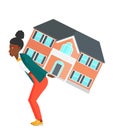 Woman carrying house.