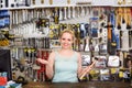 Woman cashier at pay desk Royalty Free Stock Photo