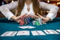 Woman in casino making bet with all chips Royalty Free Stock Photo