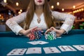 Woman in casino making bet with all chips Royalty Free Stock Photo