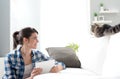 Woman and cat in the living room Royalty Free Stock Photo