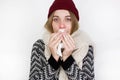 Woman Caught Cold. Sneezing into Tissue