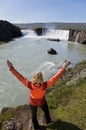 Woman Celebrating At Godafoss Waterfall, Iceland Royalty Free Stock Photo