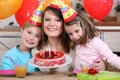 Woman celebrating with her kids Royalty Free Stock Photo