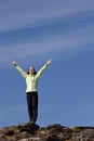 Woman Celebrating On Top Of A Mountain Royalty Free Stock Photo