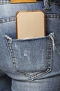 Woman with a cell phone in her back pocket Royalty Free Stock Photo