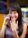 Woman, cellphone and flirt with smile, conversation and call with technology, happy and mobile. Communication, outdoor
