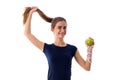 Woman with centimeter holding an apple and her hair Royalty Free Stock Photo