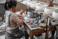 Woman at the ceramics factory.