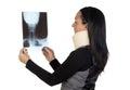 Woman with cervical collar and radiography