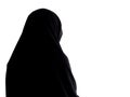 Woman in chador from behind, with copyspace. Isolated on white. Royalty Free Stock Photo