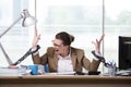 The woman chained to her working desk Royalty Free Stock Photo