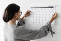 Woman checking the calendar Royalty Free Stock Photo