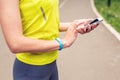 Woman checking fitness and health tracking wearable device Royalty Free Stock Photo