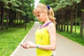 Woman checking fitness and health tracking wearable device Royalty Free Stock Photo