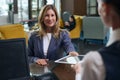 Woman checking-in in the hotel Royalty Free Stock Photo