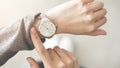 Woman checking time her watch Royalty Free Stock Photo