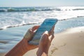 Woman Checking Weather on Smartphone at Sunny Beach Royalty Free Stock Photo