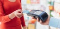 Woman at the checkout Royalty Free Stock Photo