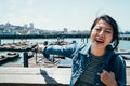 Woman cheerfully pointing showing resting seals Royalty Free Stock Photo