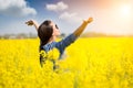 Woman cheering in the field Royalty Free Stock Photo