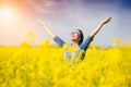 Woman cheering in the field Royalty Free Stock Photo