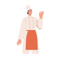 Woman chef cook in professional uniform, showing okay gesture with hand. Happy smiling female restaurant worker in hat Royalty Free Stock Photo