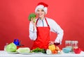 Woman chef cooking christmas dinner wear santa hat. Festive menu concept. Best christmas recipes. Enjoy easy ideas for Royalty Free Stock Photo