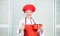 Woman chef hold whisk and pot. Girl in apron whipping eggs or cream. Start slowly whisking or beating cream