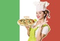 Woman chef holding pizza on Italian flag background Royalty Free Stock Photo