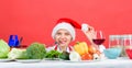 Woman chef or housewife cooking while wear santa hat. Best christmas recipes. Festive menu concept. Christmas dinner Royalty Free Stock Photo