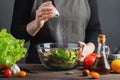 Woman chef in the kitchen preparing vegetable salad. Healthy Eating. Diet Concept. A Healthy Way Of Life. To Cook At Home. For Royalty Free Stock Photo