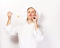 Woman chef showing a sign perfect, with pasta noodle on fork. Royalty Free Stock Photo