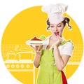 Woman chef and sweet cheesecake in her hand.Collage kitchen bac Royalty Free Stock Photo