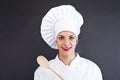 Woman cheff over dark backgrund Royalty Free Stock Photo