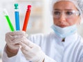 Woman chemist working in hospital clinic lab