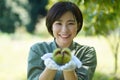 Woman with chestnuts Royalty Free Stock Photo