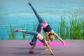 Woman and child doing handstand exercise Royalty Free Stock Photo