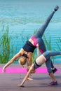 Woman and child doing handstand exercise Royalty Free Stock Photo