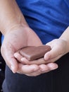 Woman and child holding chocolate heart Royalty Free Stock Photo