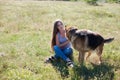 A woman with a child with German Shepherd training Royalty Free Stock Photo