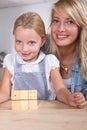 Woman and child playing dominoes