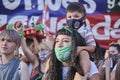 Woman with a child in a rally in defense of the legal abortion. Argentina