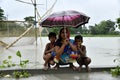 Woman and children takes shelter after flood