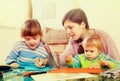 Woman and children together drawing with pencils Royalty Free Stock Photo